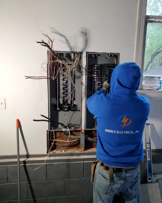 Dibble Electrical technician upgrading an electrical panel in Central Virginia
