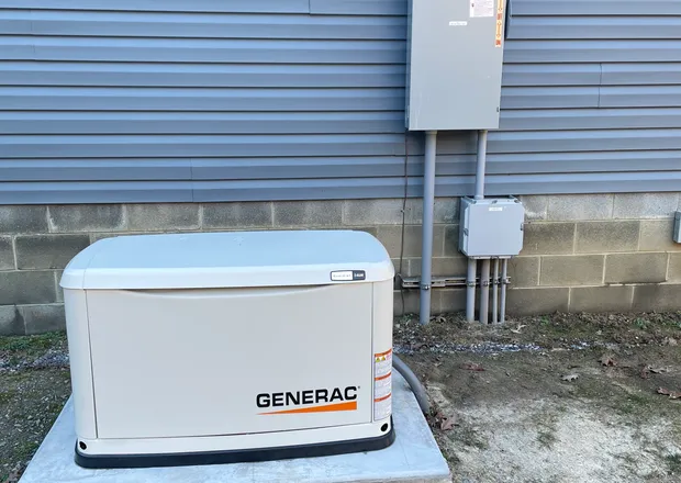 Whole-home standby generator installed beside a Central Virginia home by Dibble Electrical